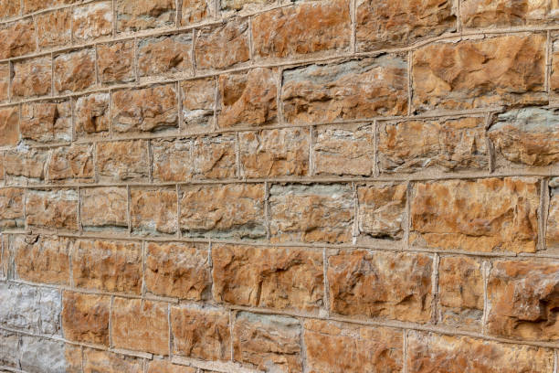 19th century limestone block wall texture with beaded mortar