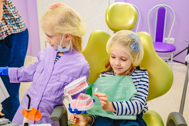 istock Children play in dentists office 1218902814