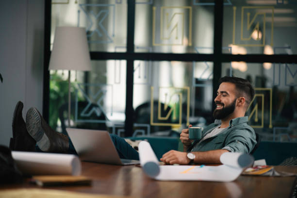 istock Young businessman working on project in office. 1218905187