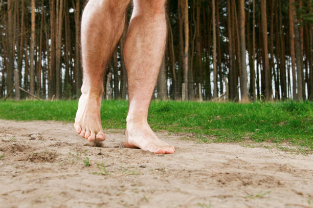 istock feet on the sand way 1218906176