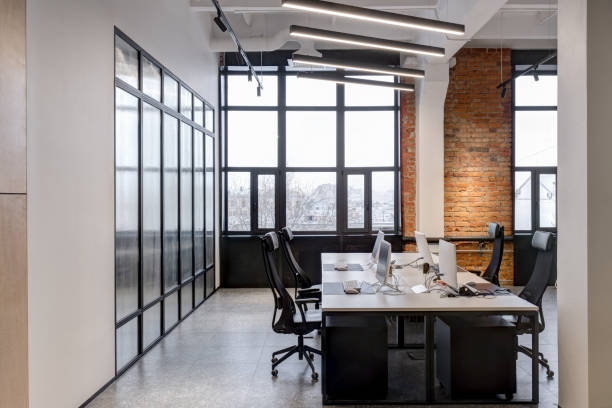 istock modern loft office interior with furniture 1218907438