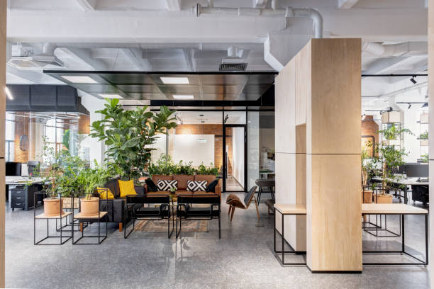 istock modern open space office interior with furniture 1218907474