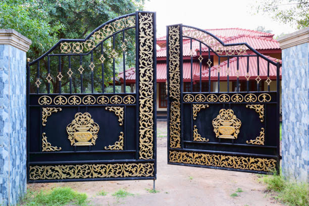 Close up view of the design in the gate handle for entry and exit.