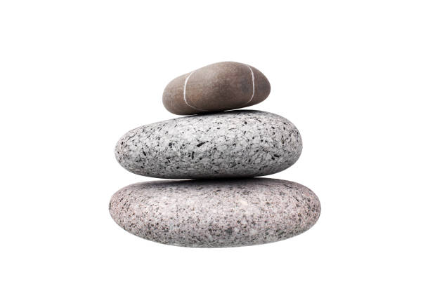 istock Pile of pebble stone on white background isolated closeup, stack of balanced zen stones, smooth sea pebbles pyramid, round cobblestones tower, yoga rocks heap, stacked balance cobble stone arrangement 1218908849
