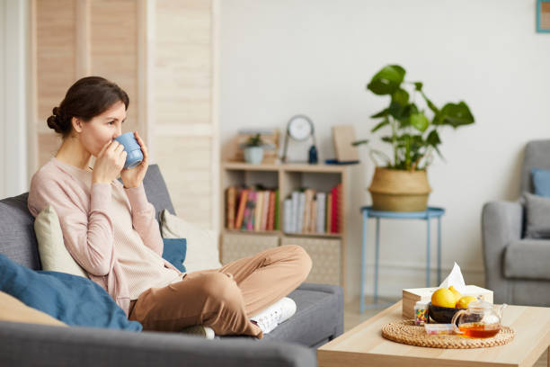 istock Woman resting at home 1218912058