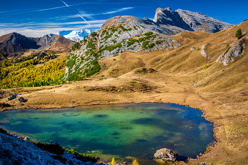 Small dolomitic Valparola lake, Valparola Pass, Dolomites, Italy