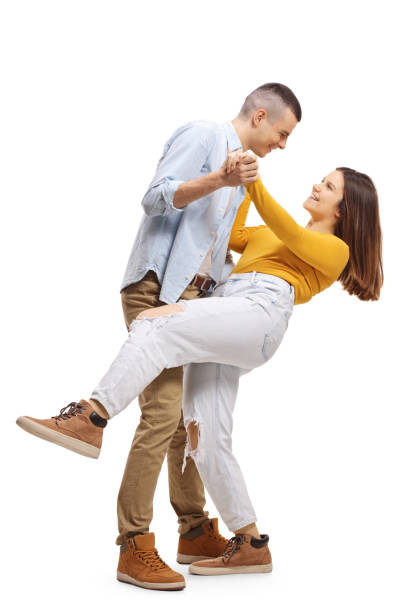 istock Young man and woman dancing tango and smiling 1218913737