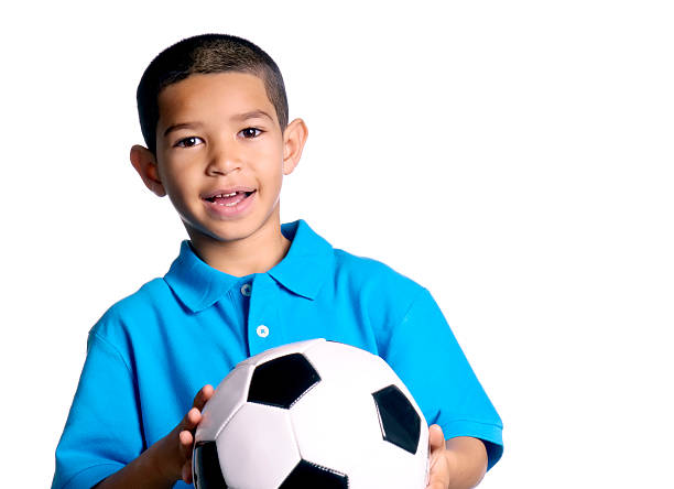 istock Little Boy With a Soccer Ball 121891466