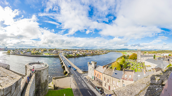 Panoramic view on river Shannon and Thomond bridge from Limerick city wall during daytime