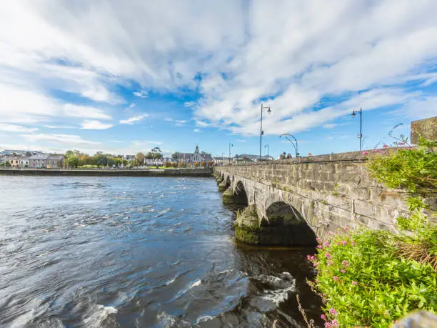 Thomond bridge in Limerick with river Shannon during daytime