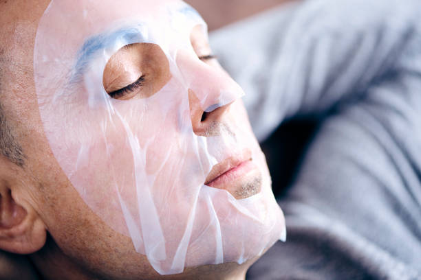 istock man wearing a facial mask 1218917789