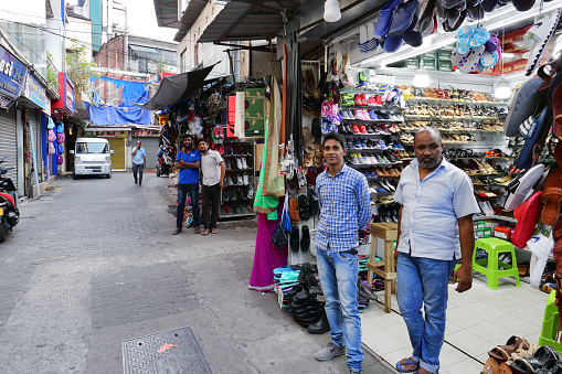 Kandy, Sri Lanka - February 9, 2020: Street shops in Kandy downtown