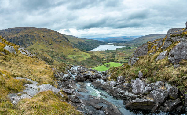 istock Typical Irish landscape with green meadows and rough mountains during daytime 1218921119