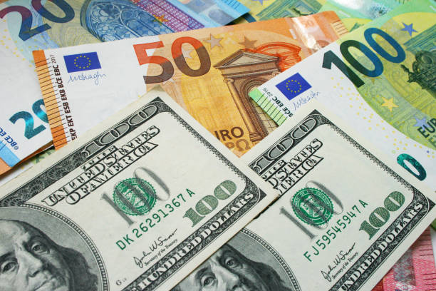 istock US Dollar vs Euro money as background 1218921529
