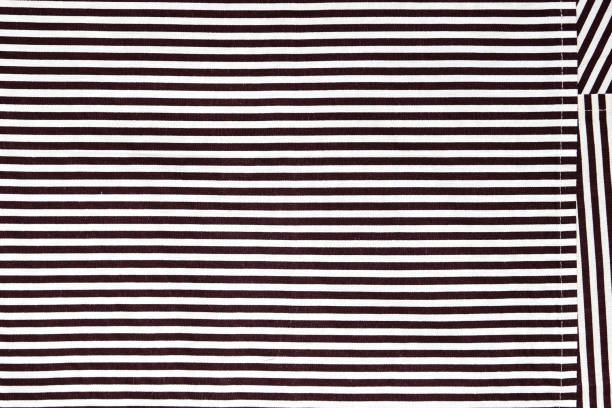 istock Towels and table napkins with stripes. Hypnotic design black and white. 1218921708