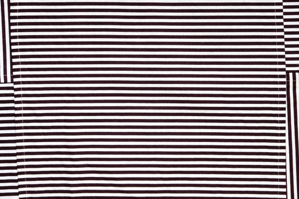 istock Towels and table napkins with stripes. Hypnotic design black and white. 1218921718