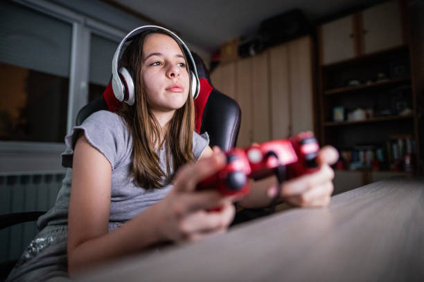 istock Girl is doing funny things at home 1218921719