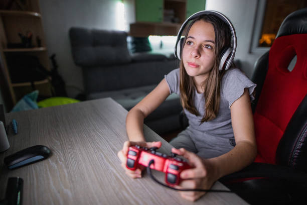 istock Girl is doing funny things at home 1218921755