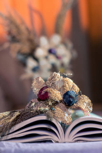 istock Ornamental flower on a book 1218926176