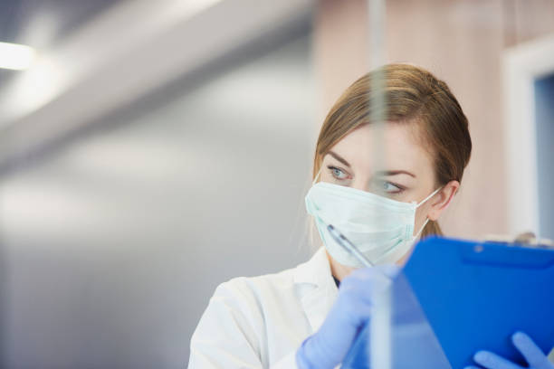 istock Doctor doing routine control in the hospital room 1218926965
