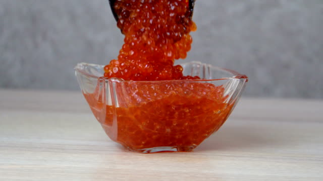 Close-up. Red caviar in a vase