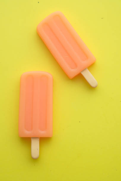 istock top view of ice cream on yellow background 1218933456