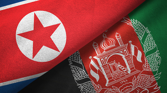 North Korea and Afghanistan flags together relations textile cloth, fabric texture