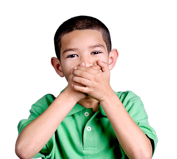 istock Little Boy Covering His Mouth 121893401