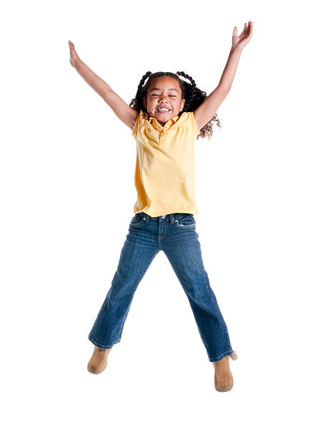 istock A young girl leaping with arms raised on a white background 121893728