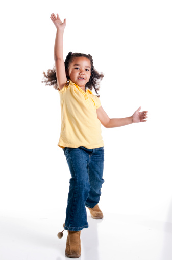 Little Girl Moving On White Background Stock Photo - Download Image Now ...
