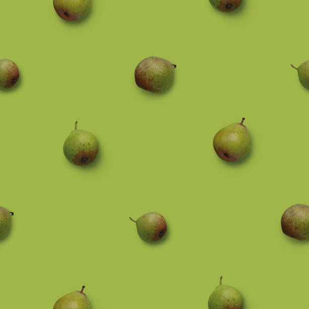 Seamless pattern with green pears photos on green background stock photo