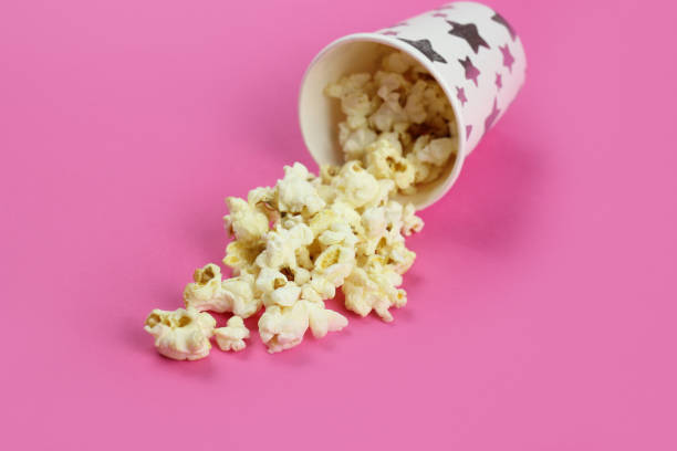 istock Inverted paper Cup with caramel popcorn background 1218940451