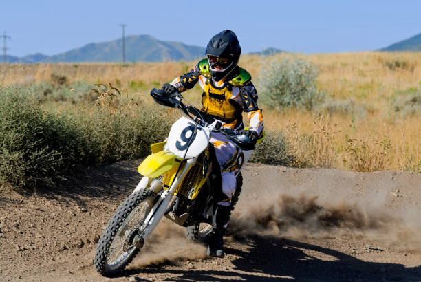 istock Young Man Riding a Dirt Bike 121894159