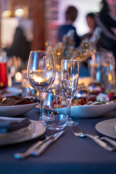 istock A vertical shot of wine glases on a dinner table with shallow backgroun 1218942641