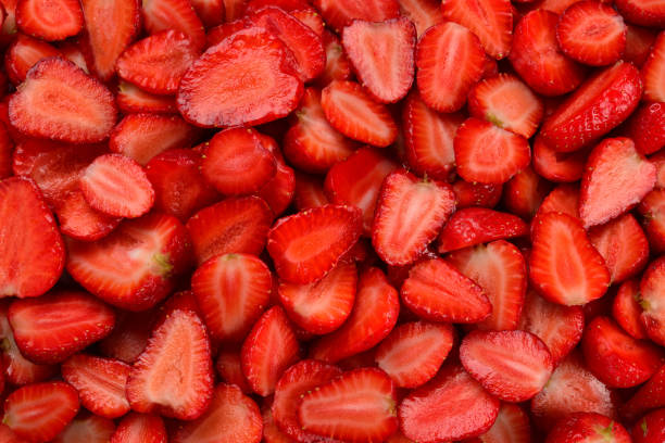 istock Strawberry slices. Fresh berries macro. Fruit background. Top view. 1218943593
