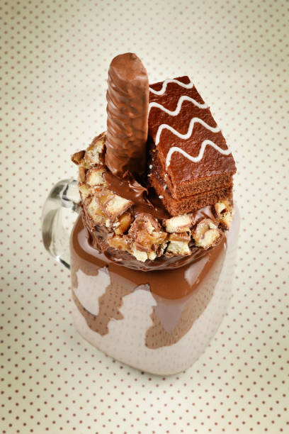 istock Chocolate extreme milkshake with brownie cake, chocolate paste and sweets. Crazy freakshake food trend. Copy space 1218943675
