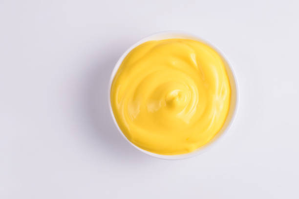 istock Cheese sauce in white plate on white background. 1218943682