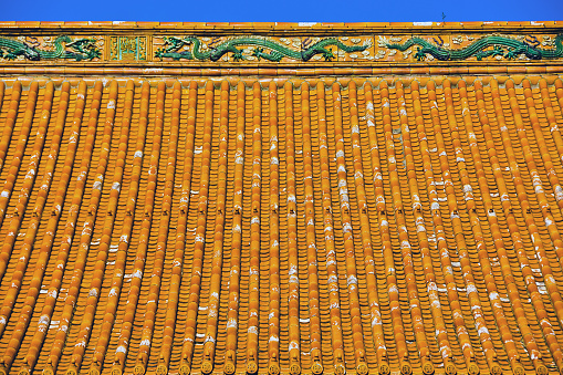 Glazed tiles  have been used in China since the Zhou Dynasty as a material for roofs. During the Song Dynasty, the manufacture of glazed tiles was standardized in Li Jie's Architecture Standard.