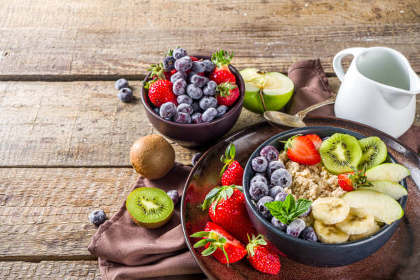 istock Breakfast oats with fruit and berry 1218947345