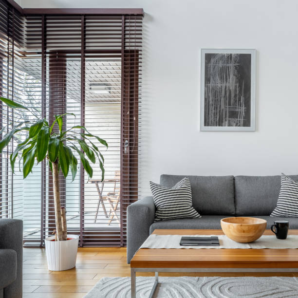 istock Stylish living room with big windows 1218947549