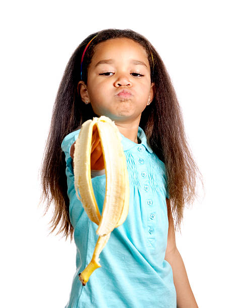 istock Girl Holding a Banana Peel 121894870