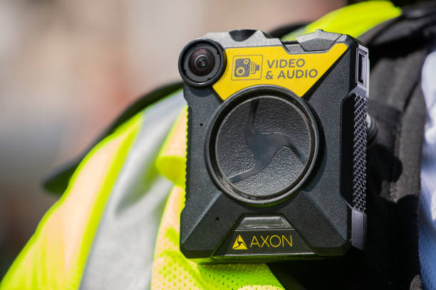 Body camera being worn by police officers in London, to keep officers safe, enabling situation awareness, improving community relations and providing evidence for trials. London, UK. 26th June 2019. Axon video & audio body camera used by the police in the UK. neural axon stock pictures, royalty-free photos & images