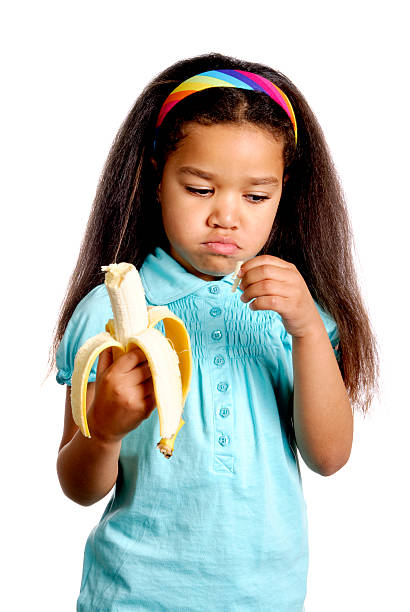 istock Girl Holding a Banana 121894877