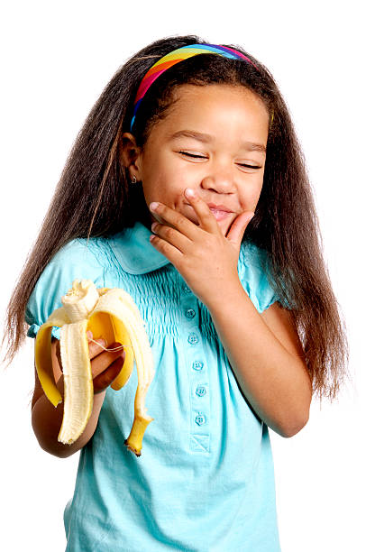 istock Girl Eating a Banana 121894887