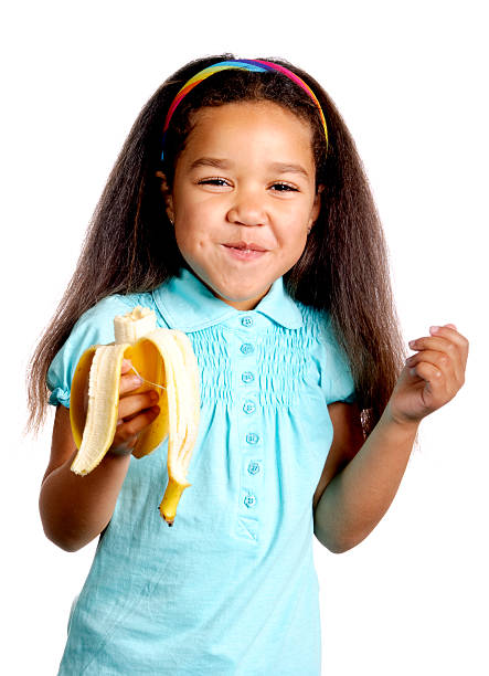 istock Girl Holding a Banana Peel 121894954