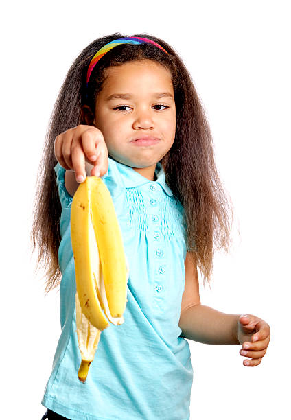 istock Girl with a Banana Peel 121894957