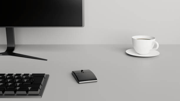 istock Desktop detail with a computer screen, keyboard, mouse and a cup of coffee 1218949767