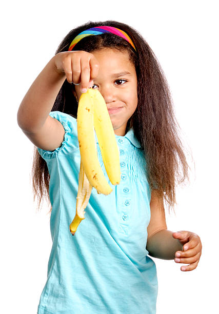 istock Girl with a Banana Peel on White Background 121895076