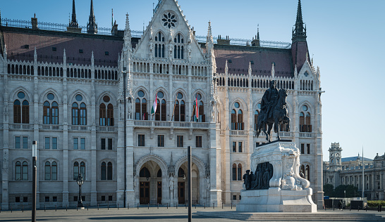 BUDAPEST, HUNGARY AUGUST 2019: Budapest Parliament building with the Count Gyula Andrassy equestrian statue  originally installed in 1906 then demolished by the Communist authorities after 1945