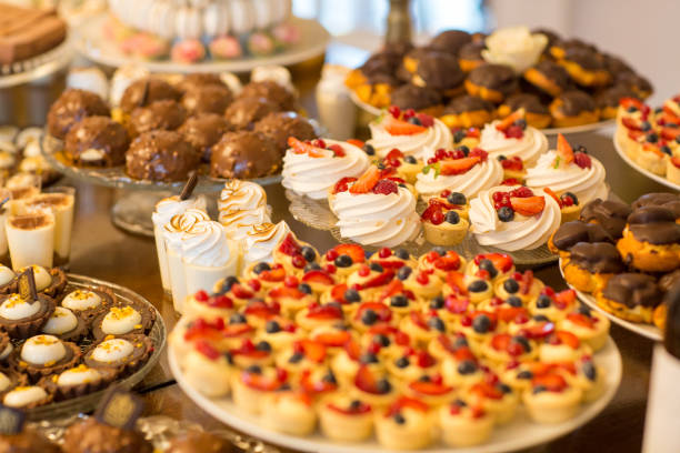 istock Delicious candy bar with macaroons, cupcakes and other sweets 1218959474